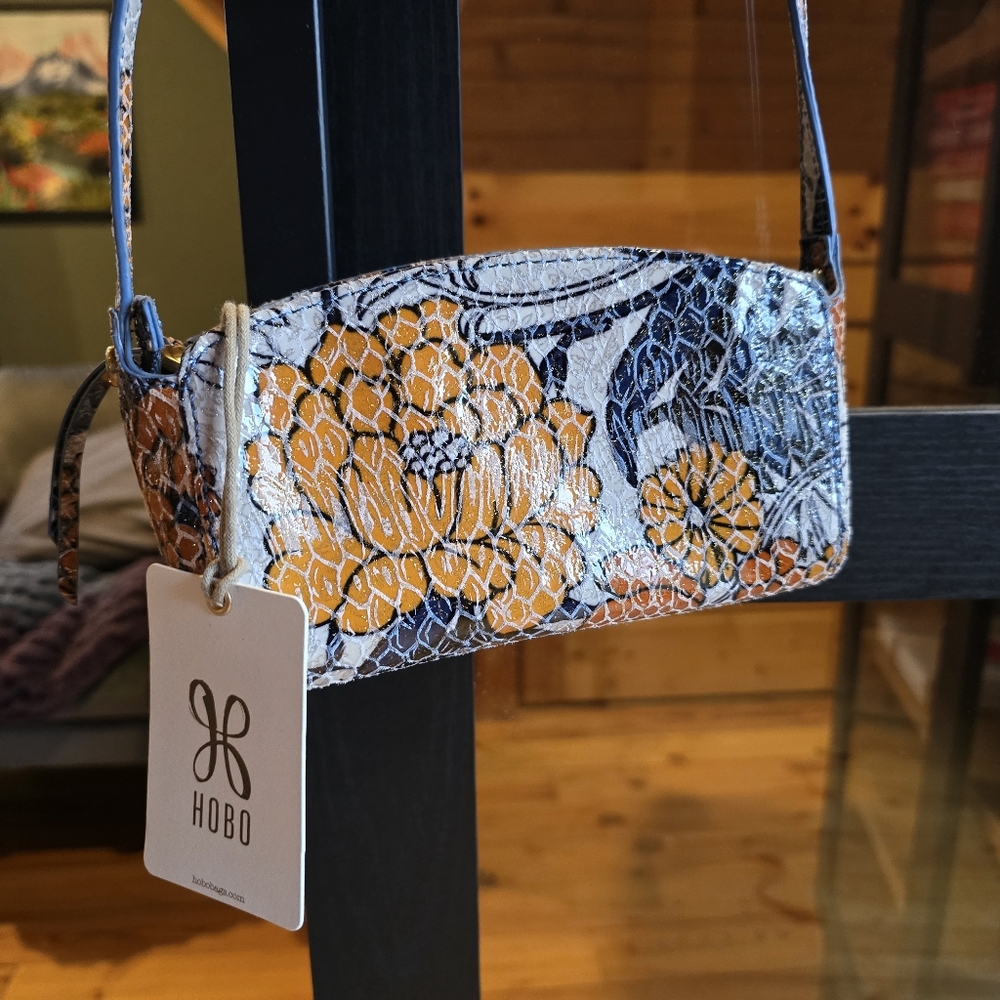 HOBO Yellow Floral Leather Wristlet with Blue Accents